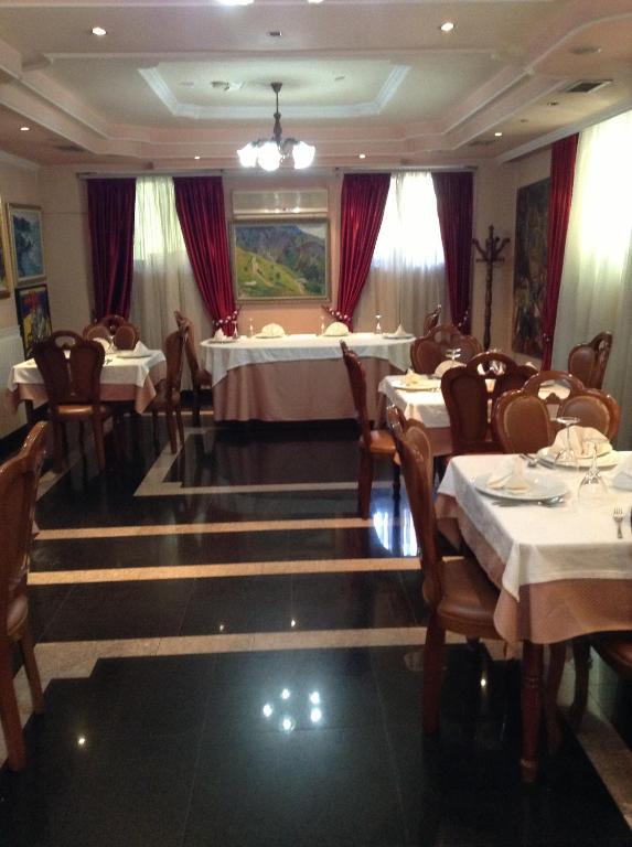 Art Hotel Nirvana Тирана Ресторан фото